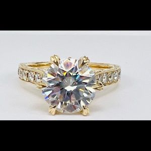 Custom 2.50 carat brilliant moissonite with .48 shank of brilliant diamonds
